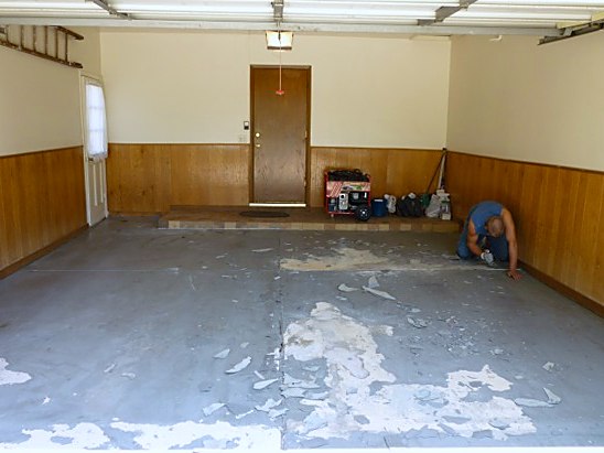Stained garage floor before coating