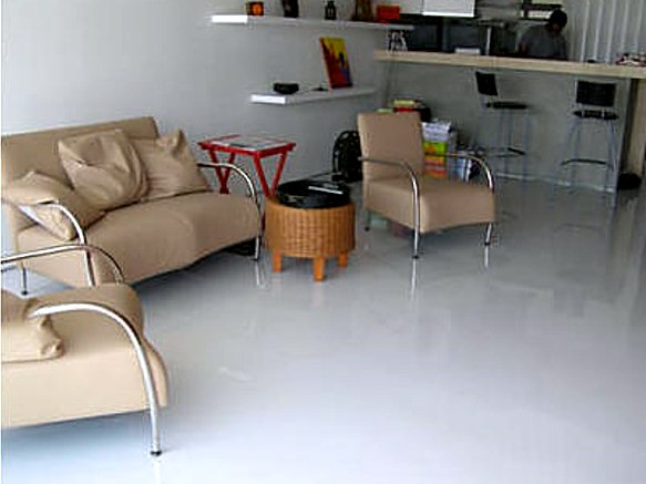 Finished white epoxy floor in a lounge