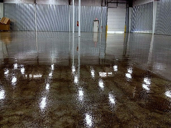 Clear topcoat over an epoxy garage floor
