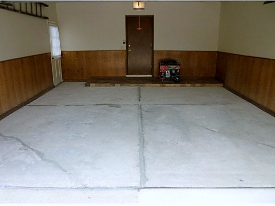 Grinding a garage slab before coating